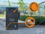 graphic of igusnSolar powered trash bin with orange dots highlighting where the plain bearings are located